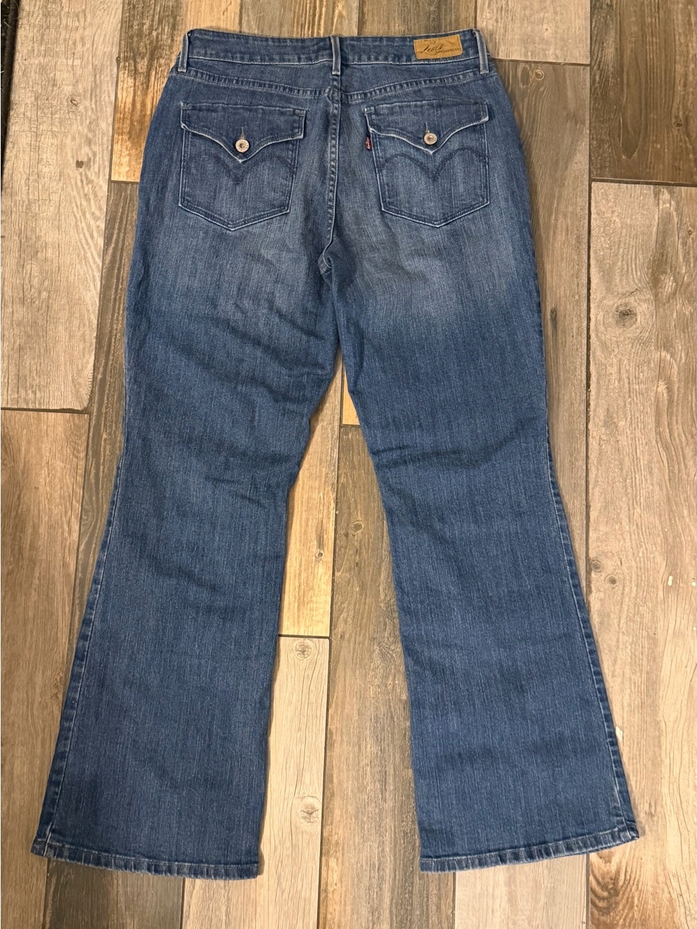 Vintage Y2k Levi's Dark Blue Flare Jeans with Button-Flap Back Pockets